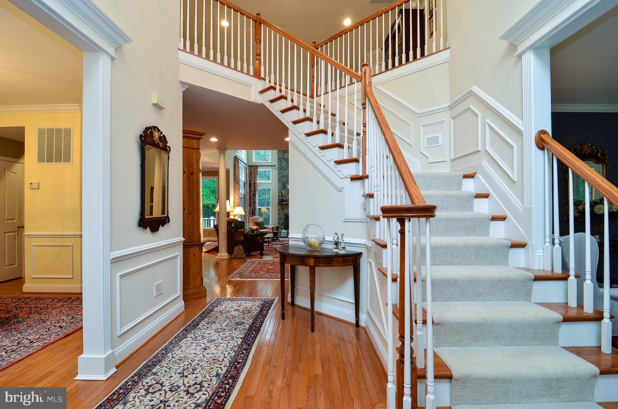 7824 Brink Road Gaithersburg, MD 20882 - Photo 2 of 30 Grand Entrance Foyer w/ Curved Staircase.