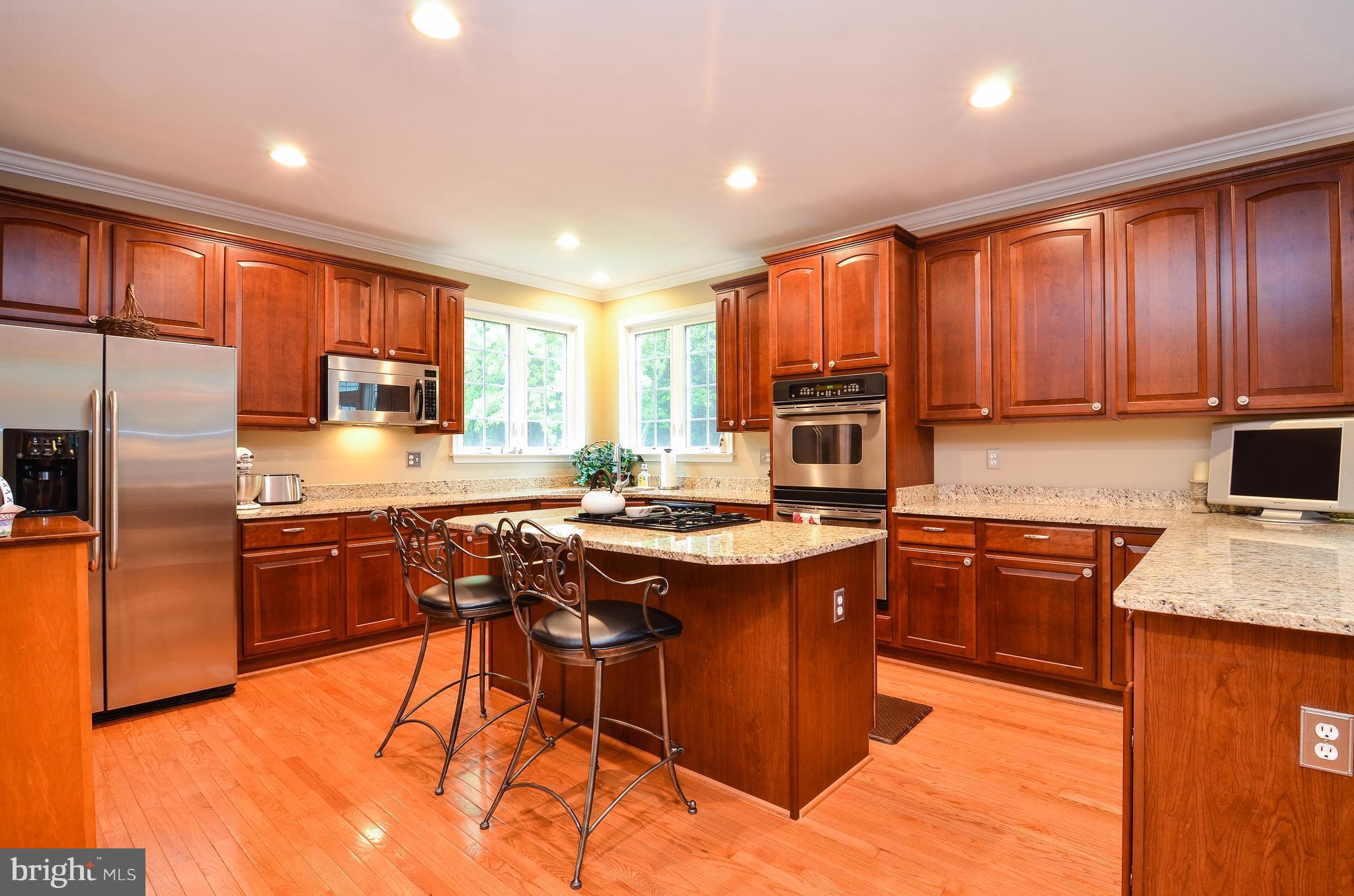 7824 Brink Road Gaithersburg, MD 20882 - Photo 12 of 30 Kitchen: Granite Counters & SS Appliances.