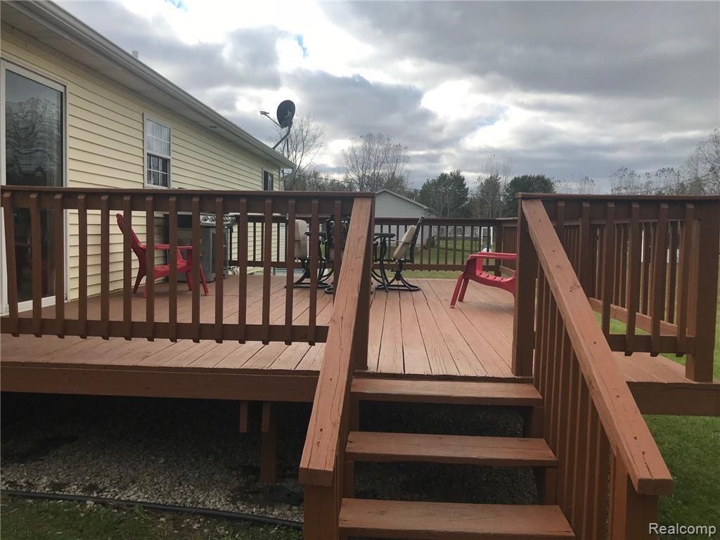 10068 West Sober Road Fowlerville, MI 48836 - Photo 21 of 23 Large Freshly Stained Deck