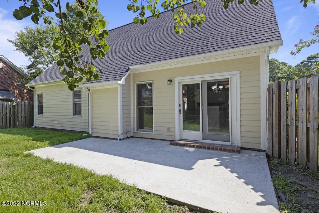 1111 Mill Run Road Sneads Ferry, NC 28460 - Photo 24 of 30 Back patio with fenced yard