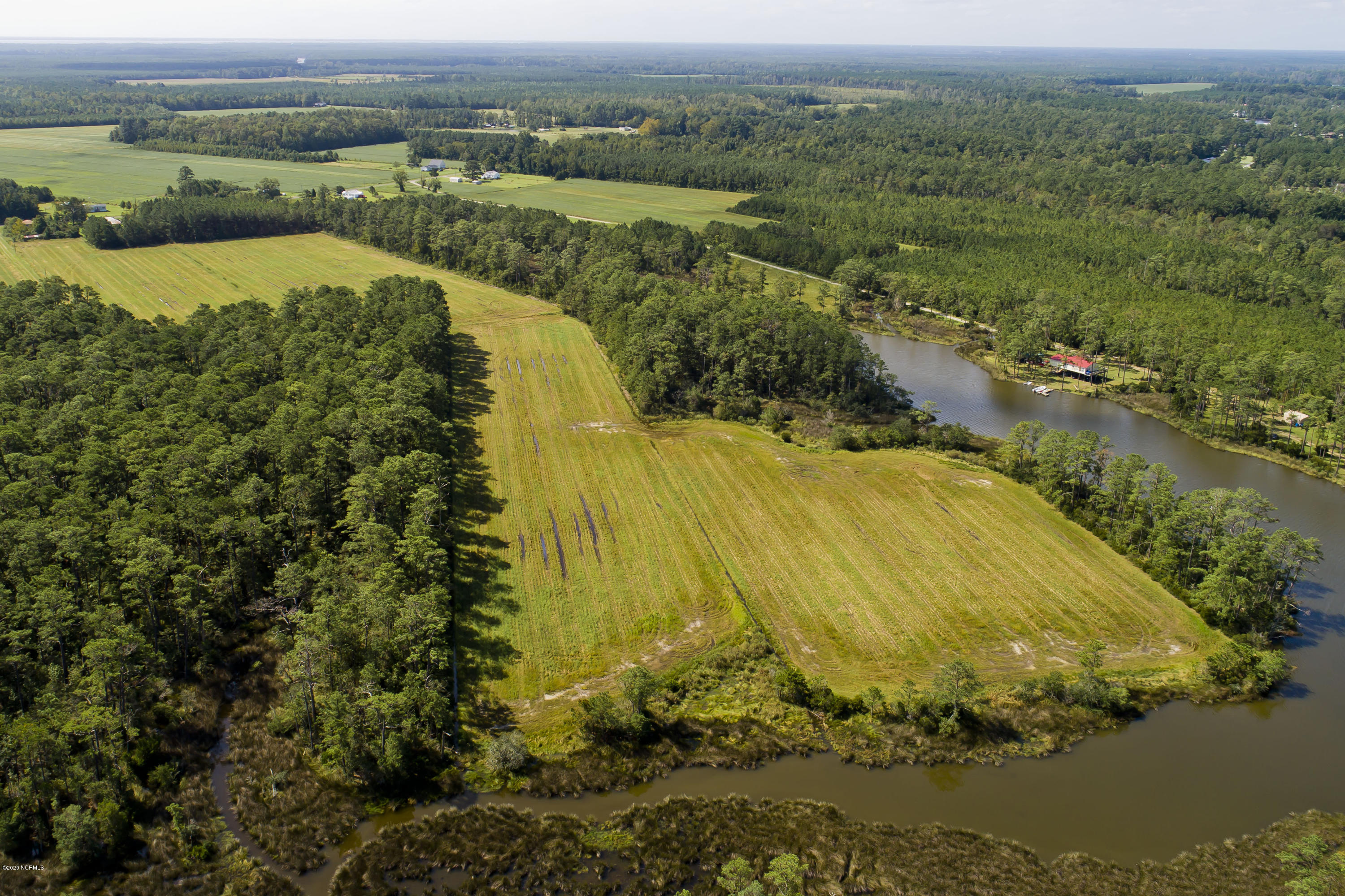 7011 Florence Road Merritt, NC 28556 - Photo 11 of 30 N Side Looking S-Cabin Creek Around Land
