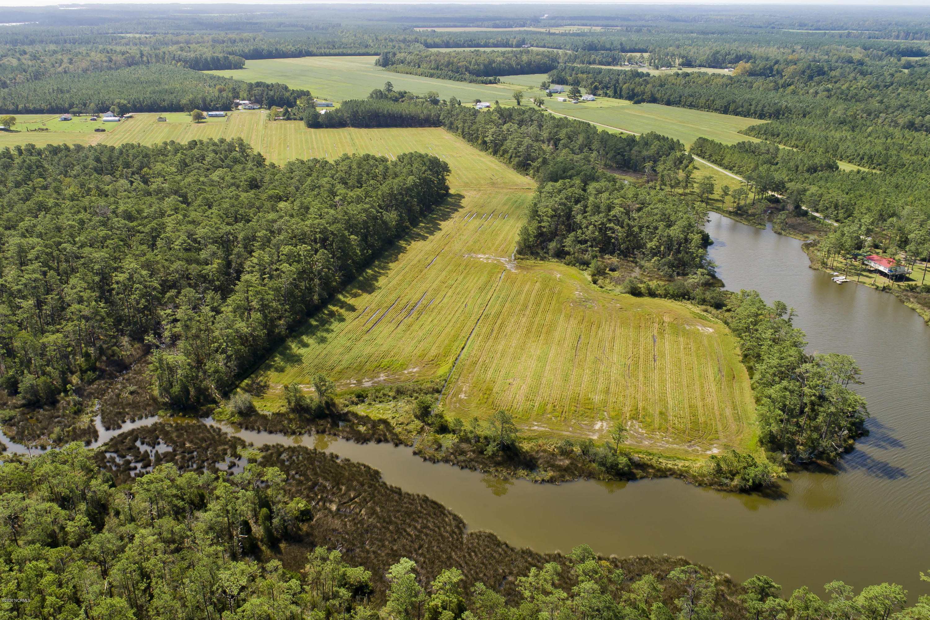 7011 Florence Road Merritt, NC 28556 - Photo 2 of 30 N Side Looking S-Cabin Creek Around Land