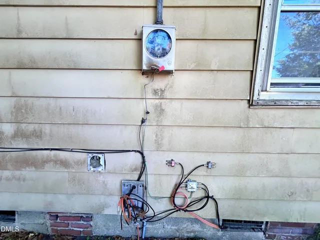 a house is sitting in middle of forest