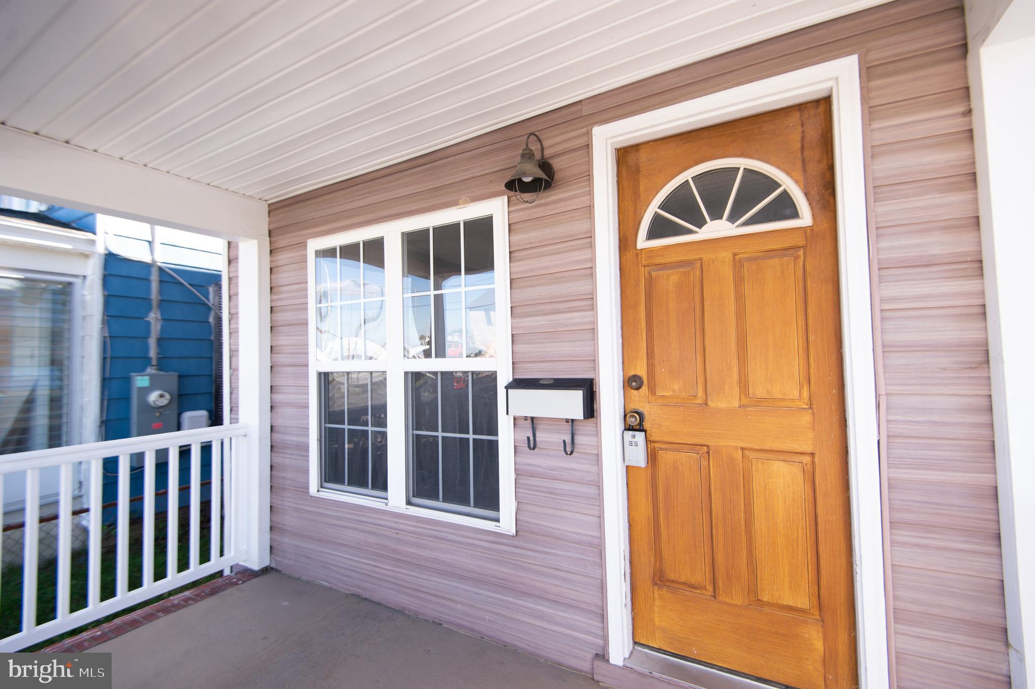 102 Hayward Street Cambridge, MD 21613 - Photo 2 of 35 a front view of a house with a window