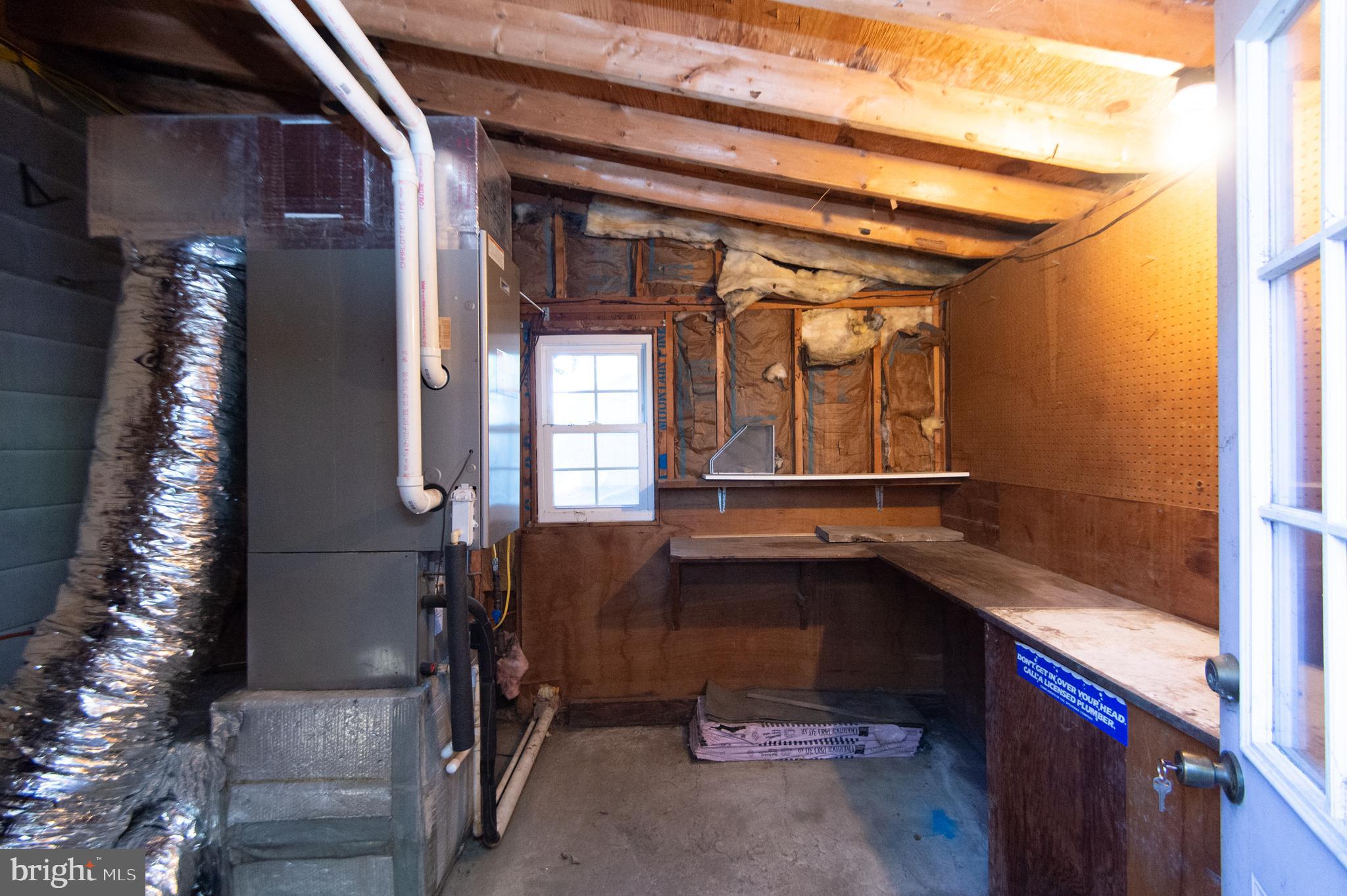 102 Hayward Street Cambridge, MD 21613 - Photo 27 of 35 a bathroom with a bathtub and shower