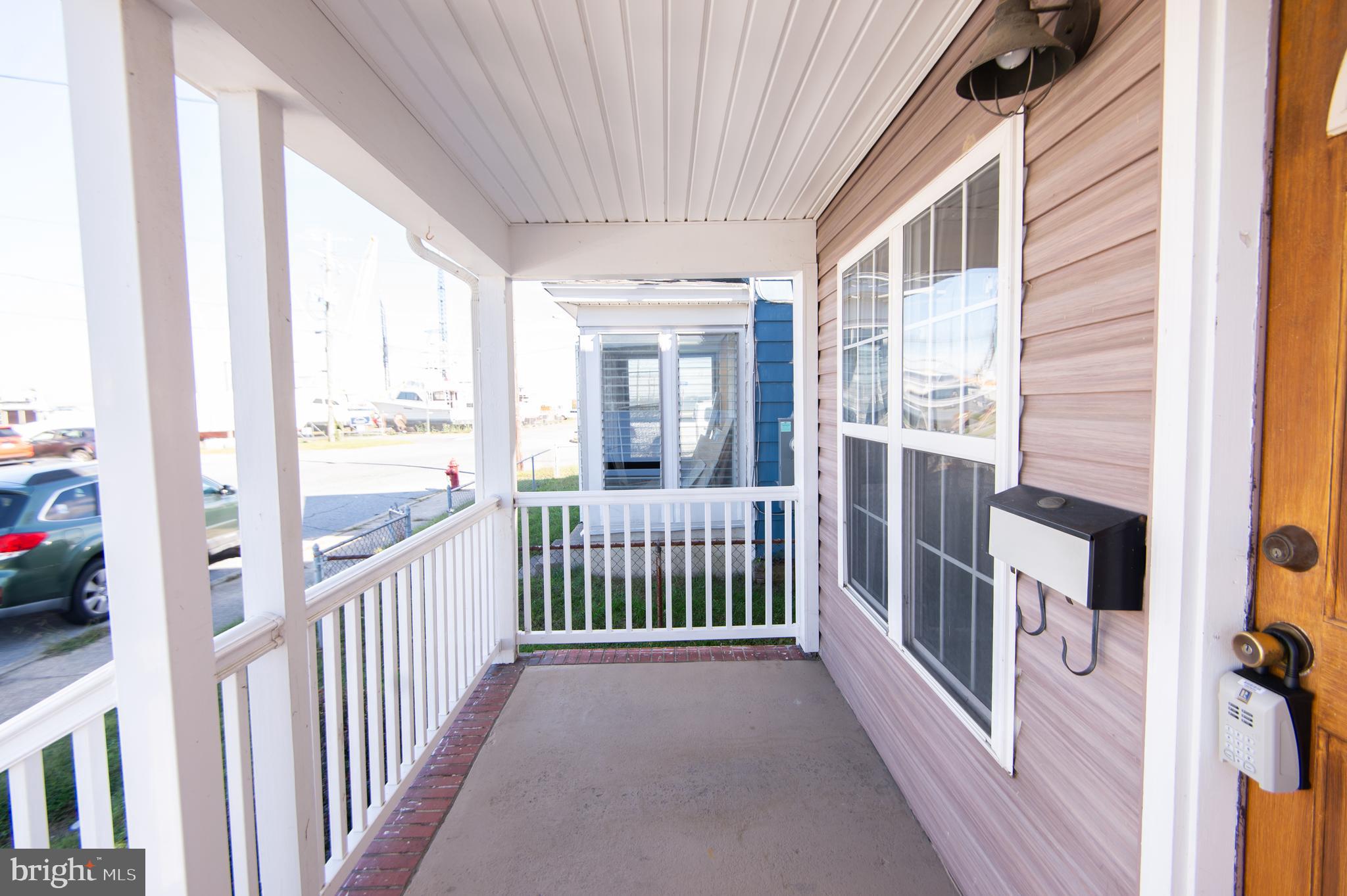 102 Hayward Street Cambridge, MD 21613 - Photo 3 of 35 a view of a house with a porch