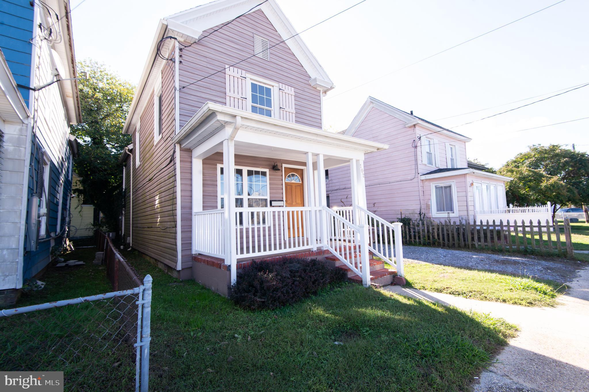 102 Hayward Street Cambridge, MD 21613 - Photo 34 of 35 a view of a house with a yard and deck