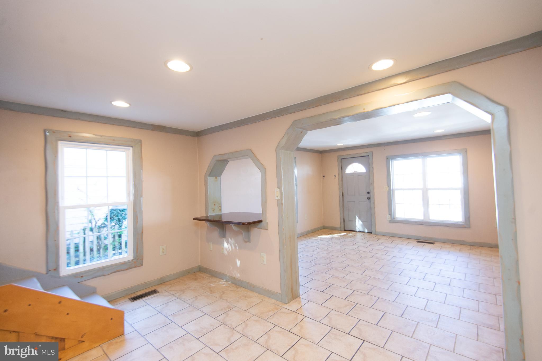 102 Hayward Street Cambridge, MD 21613 - Photo 8 of 35 a view of an empty room and window