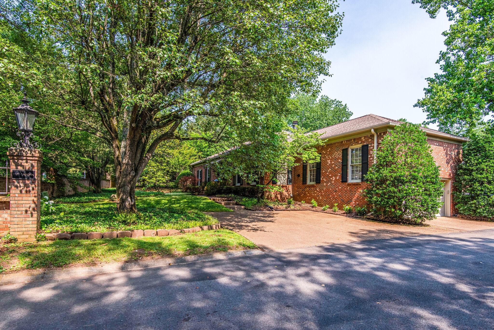 3718 Hobbs Road Nashville, TN 37215 - Photo 3 of 29 a view of a house with backyard and trees