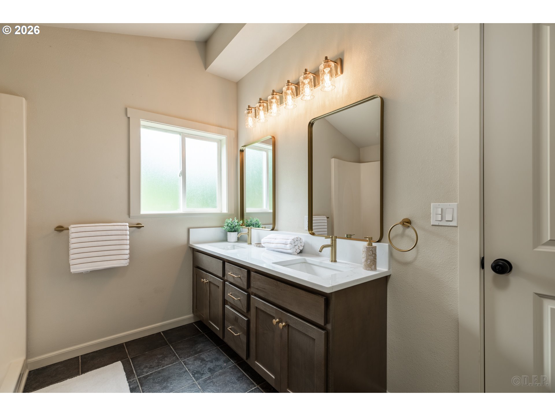 29234 Thistle Hill Road Rainier, OR 97048 - Photo 15 of 33 a bathroom with a sink vanity and mirror