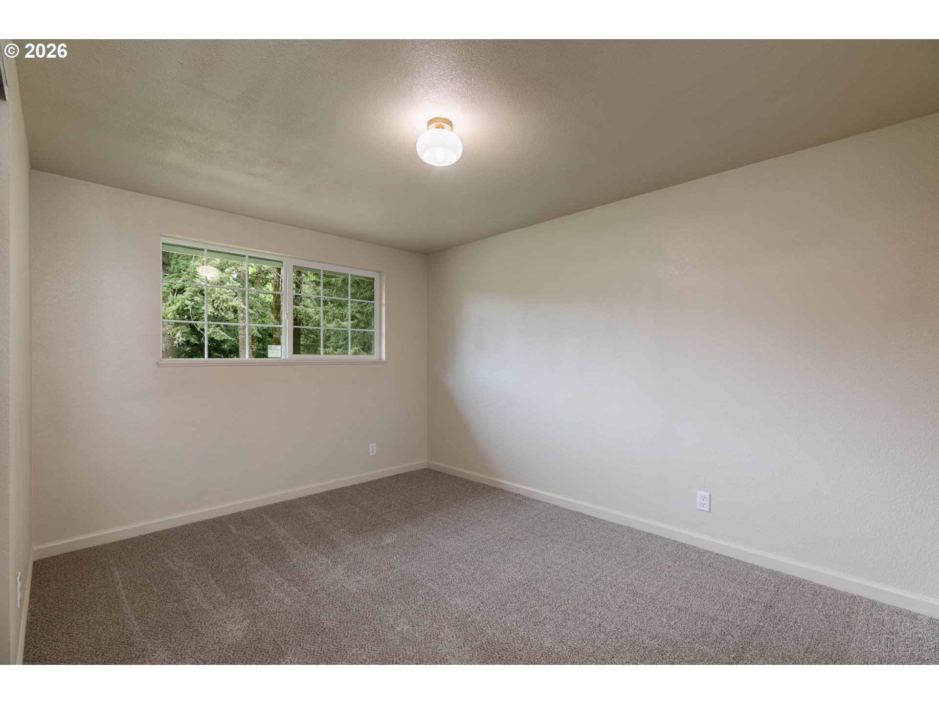 29234 Thistle Hill Road Rainier, OR 97048 - Photo 20 of 33 a view of an empty room and windows