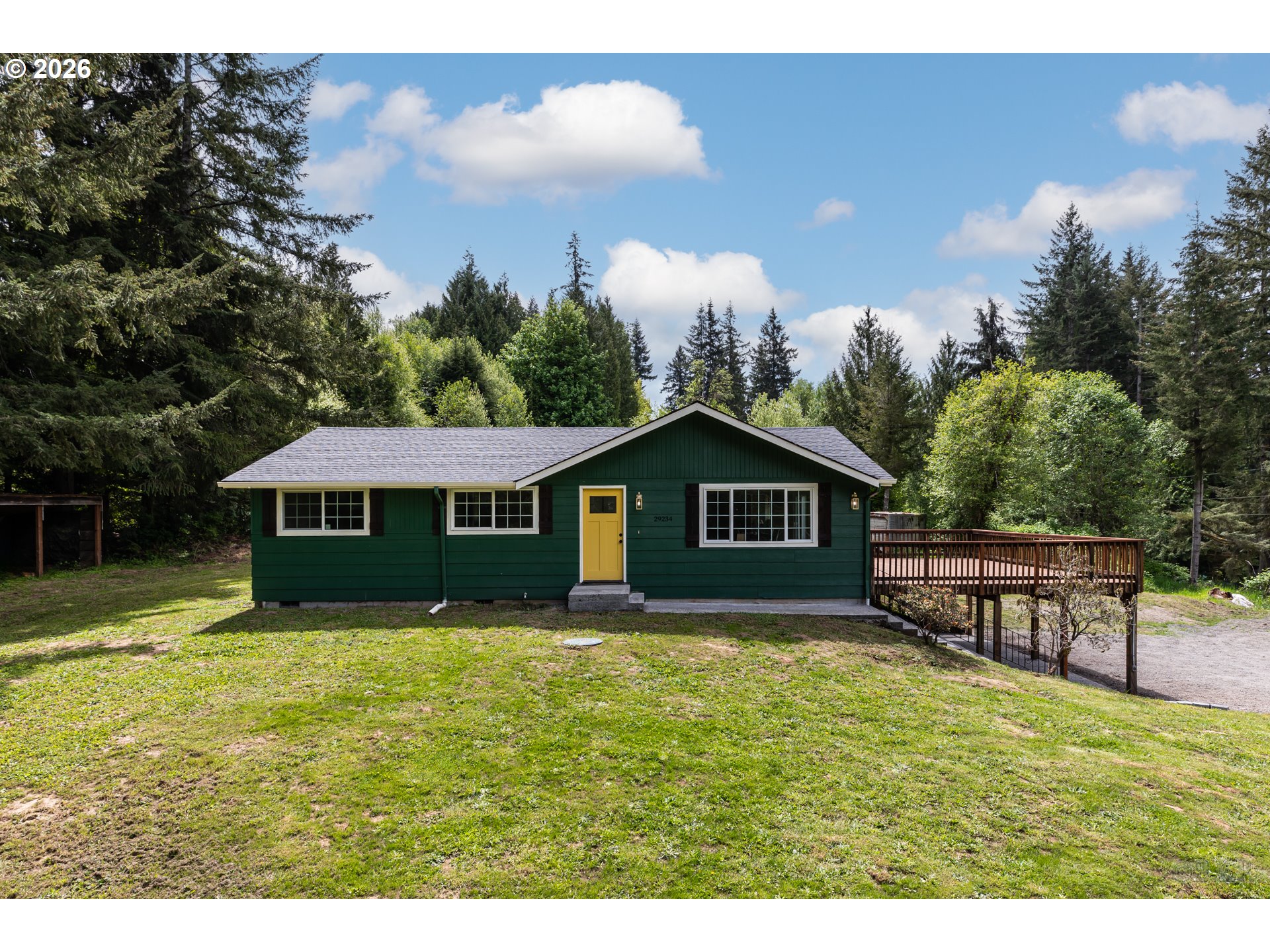 29234 Thistle Hill Road Rainier, OR 97048 - Photo 26 of 33 a house view with a garden space