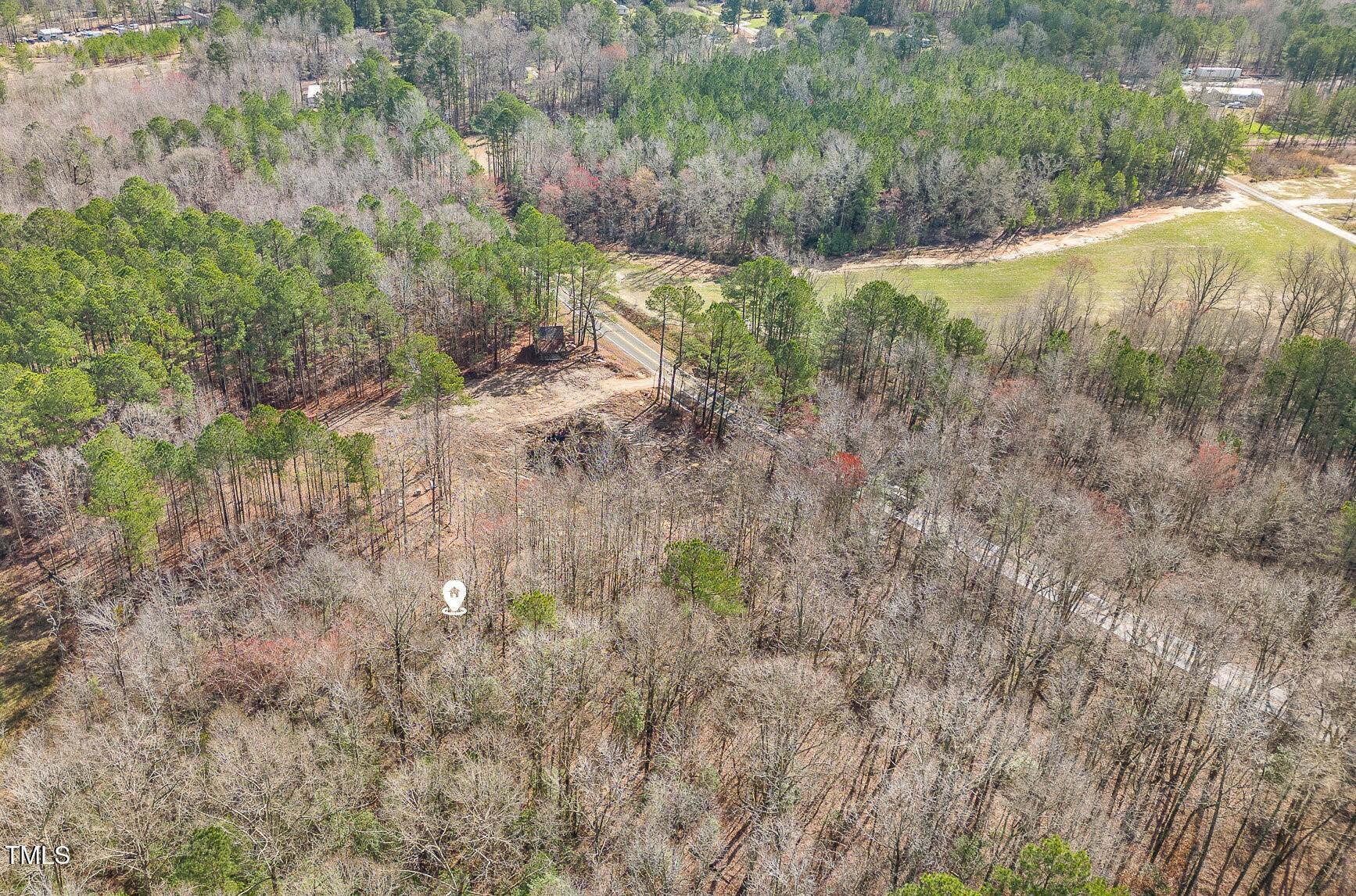 6905 Buck Road Wendell, NC 27591 - Photo 14 of 15 a view of a yard with a tree