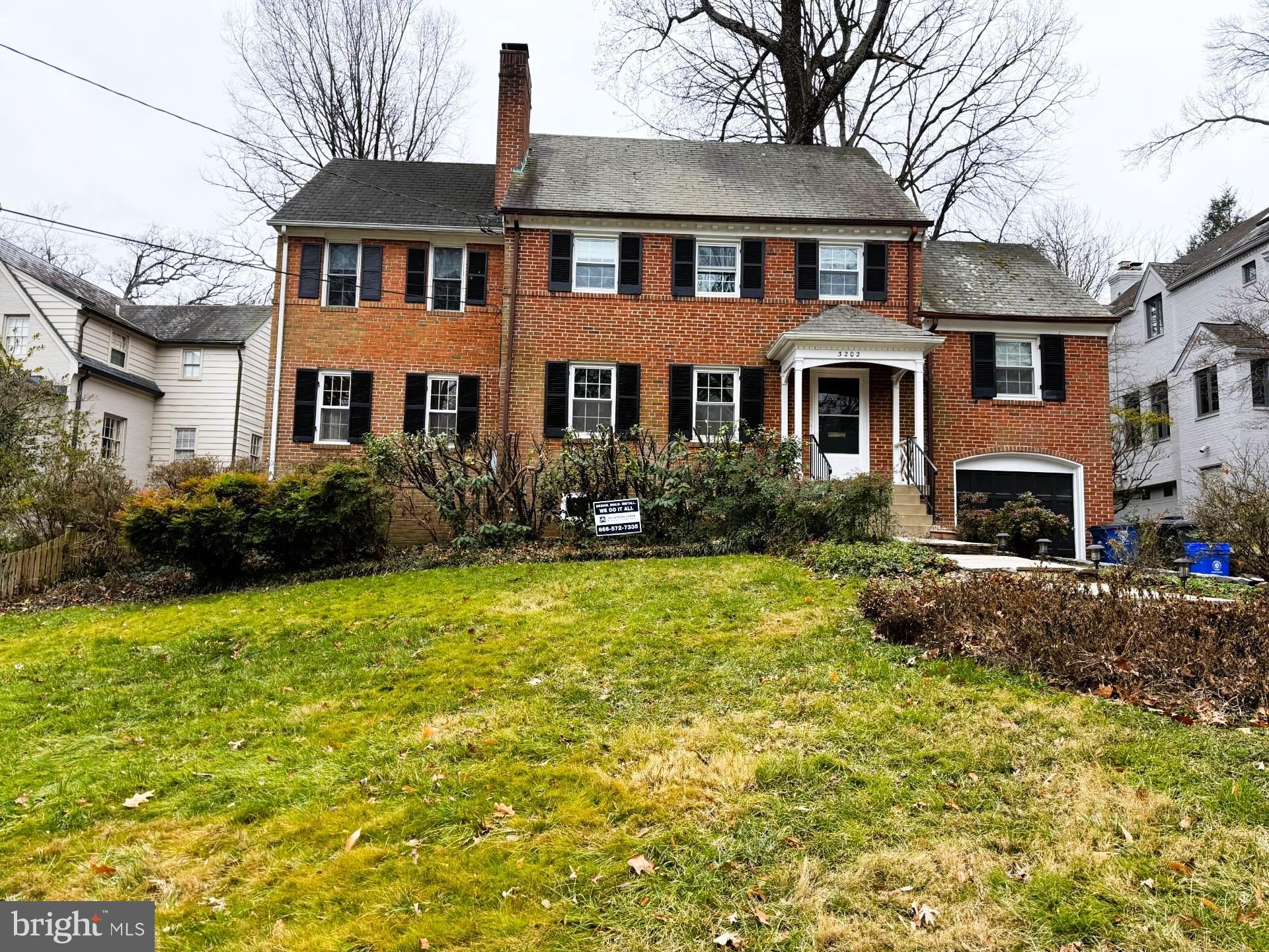 3202 Rolling Road Chevy Chase, MD 20815 - Photo 1 of 43 a front view of a house with yard and trees