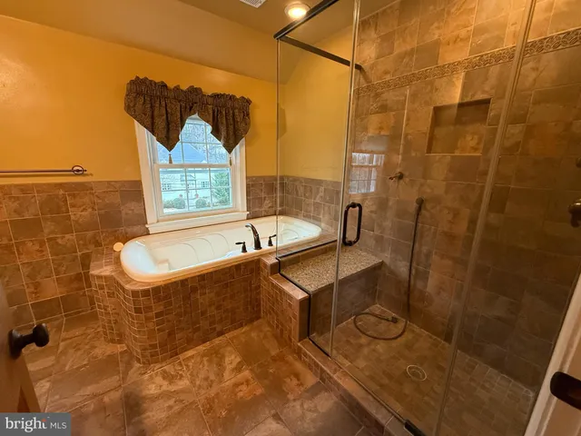 a bathroom with a sink and a bathtub