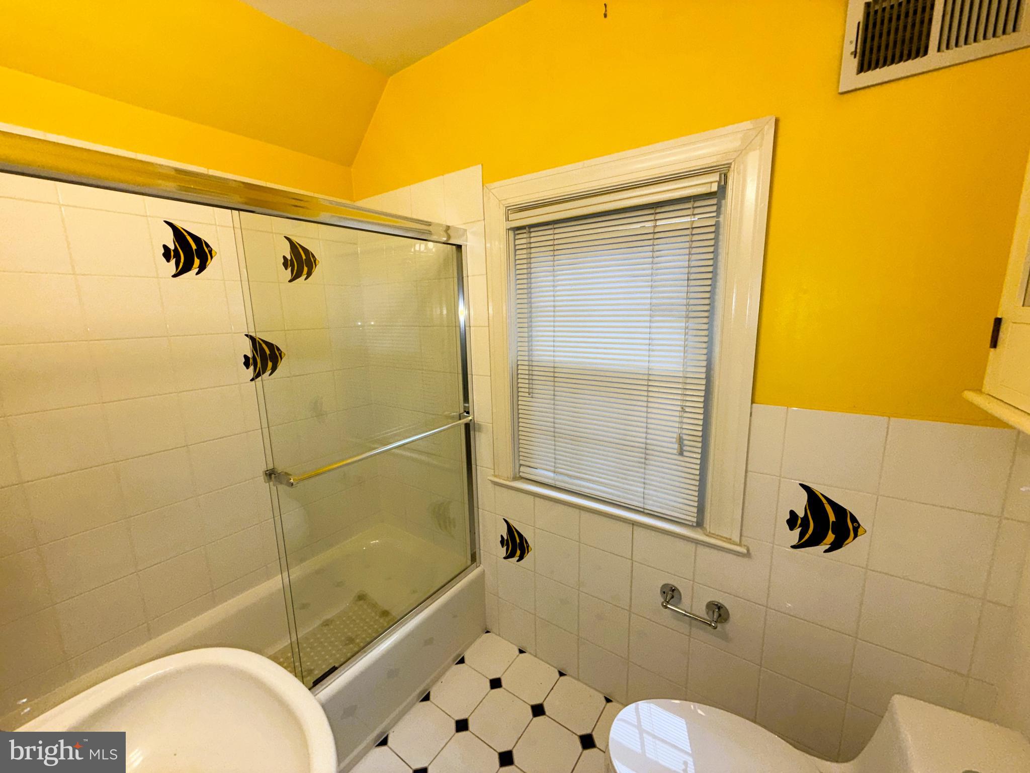 3202 Rolling Road Chevy Chase, MD 20815 - Photo 29 of 43 a bathroom with a shower and toilet