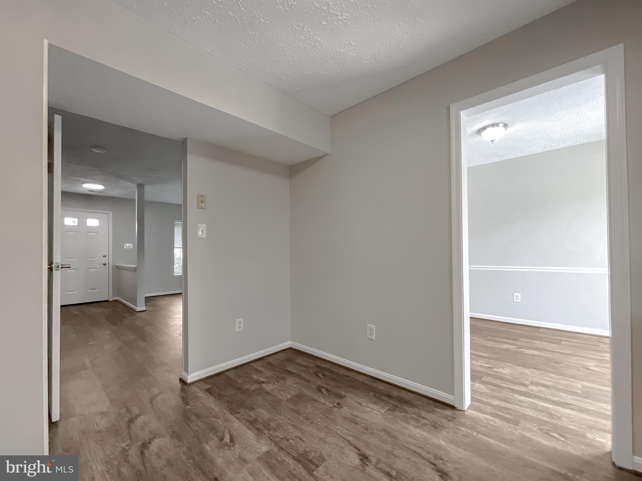 4232 Drake Court Waldorf, MD 20603 - Photo 12 of 25 wooden floor in an empty room