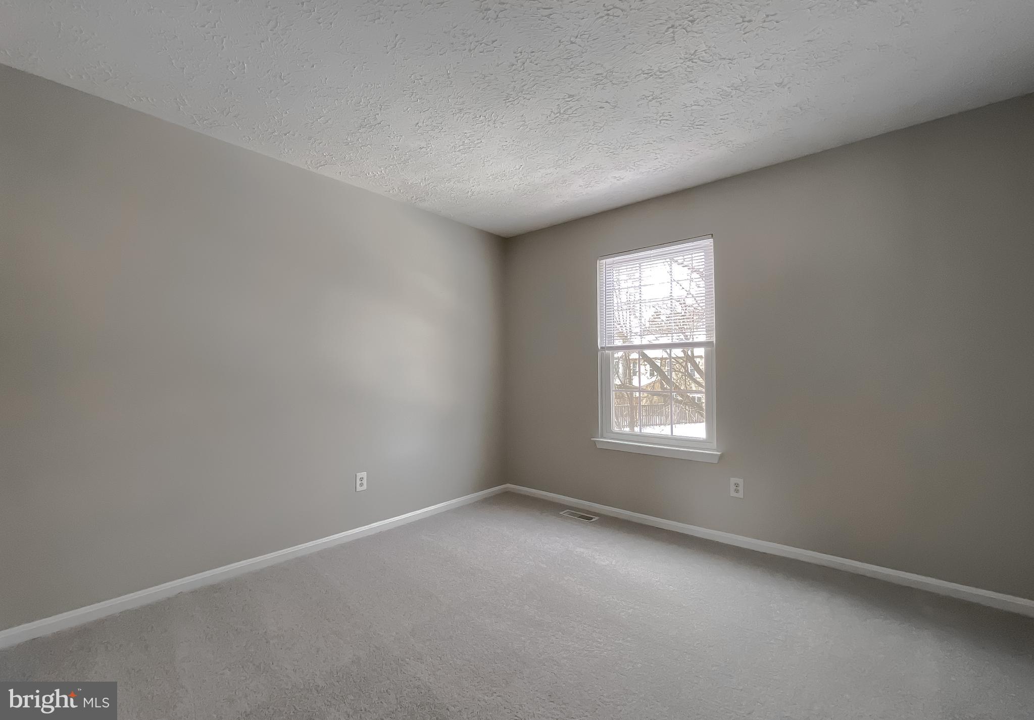 4232 Drake Court Waldorf, MD 20603 - Photo 15 of 25 an empty room with windows