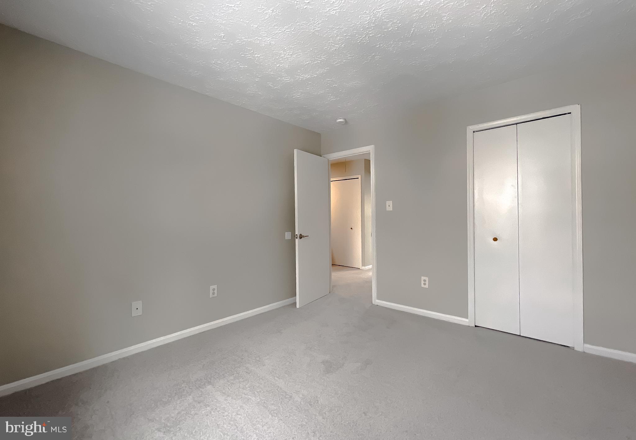 4232 Drake Court Waldorf, MD 20603 - Photo 16 of 25 a view of an empty room and closet area