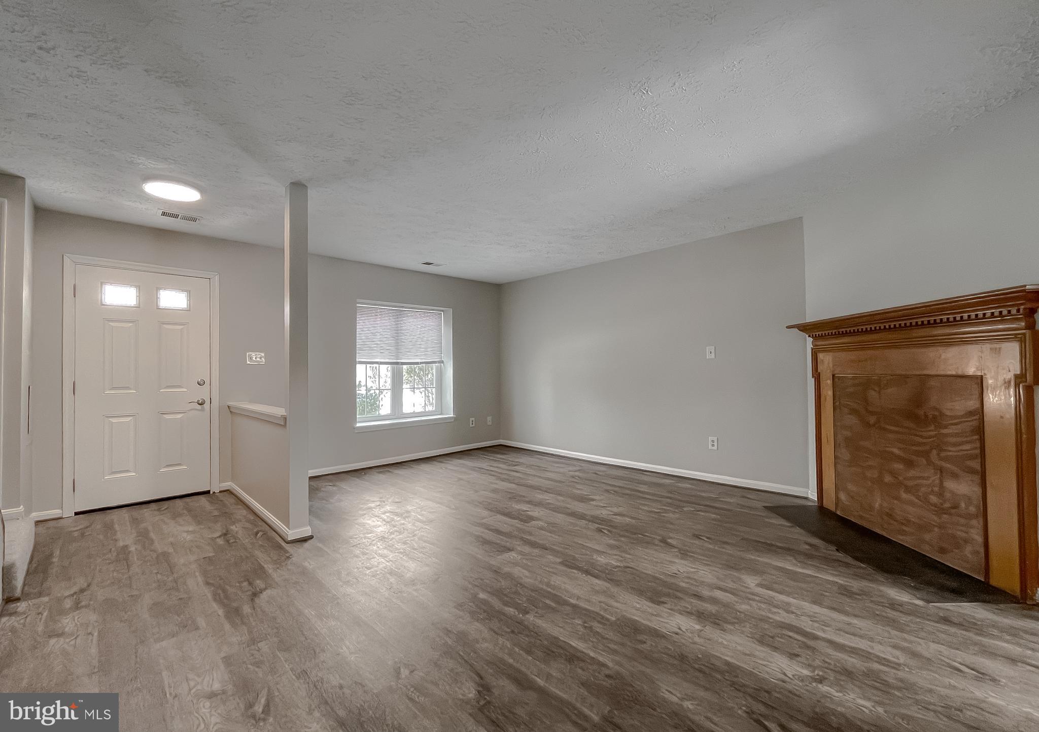 4232 Drake Court Waldorf, MD 20603 - Photo 2 of 25 a view of an empty room and window