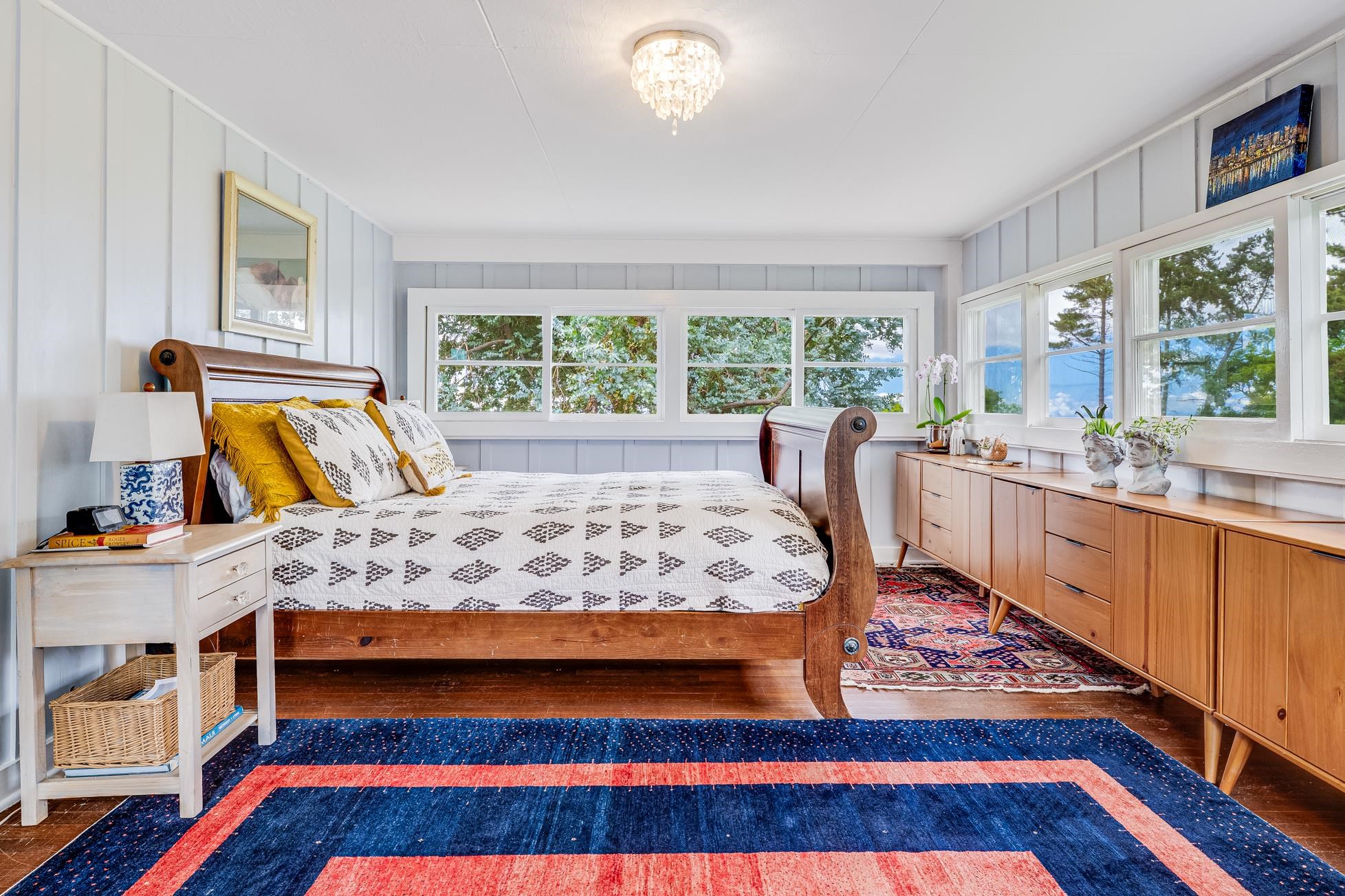 505 Alae Road Kula, HI 96790 - Photo 15 of 36 a bed sitting in a bedroom next to a window