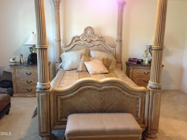 a bed room with a bed and a couch