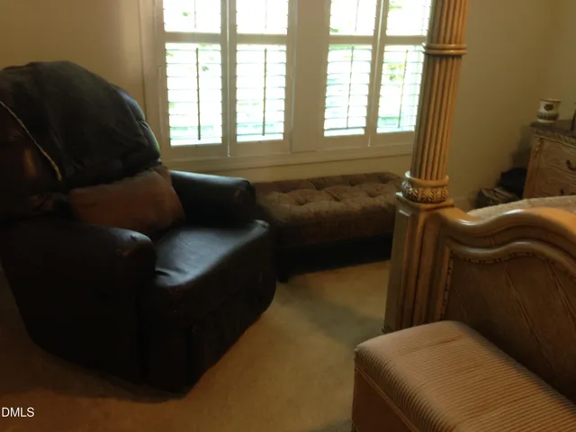 a bathroom with a sink vanity and a mirror