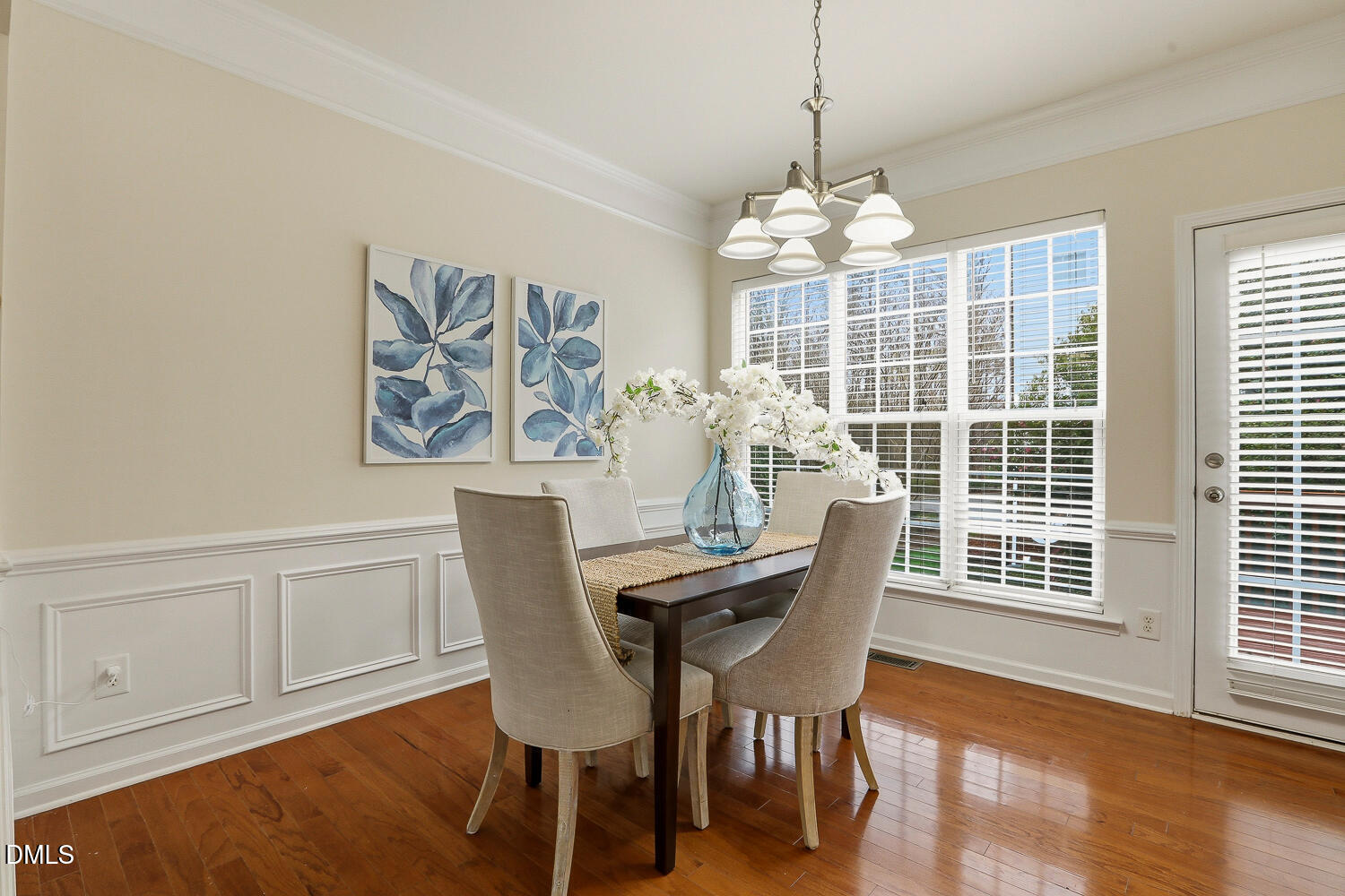 2510 Silverpalm Street Raleigh, NC 27612 - Photo 11 of 65 a view of a dining room with furniture window and wooden floor