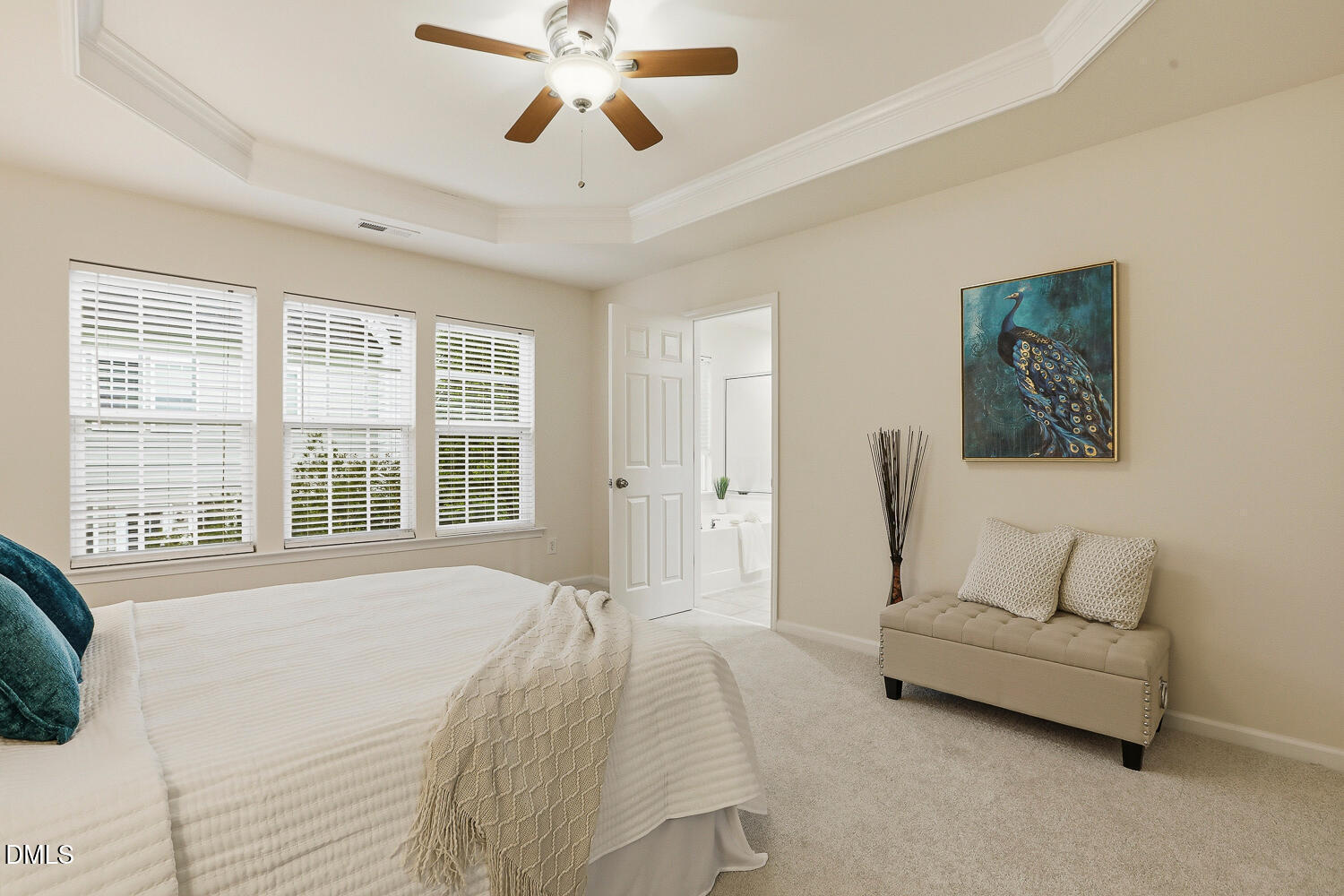 2510 Silverpalm Street Raleigh, NC 27612 - Photo 31 of 65 a spacious bedroom with a bed and a large window