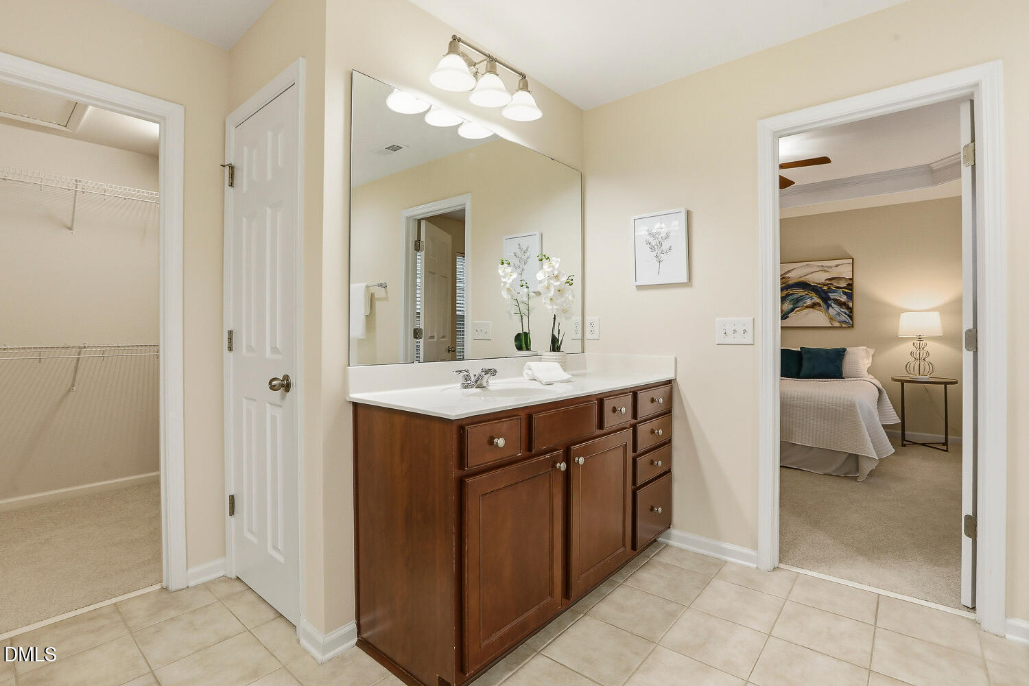 2510 Silverpalm Street Raleigh, NC 27612 - Photo 38 of 65 a spacious bathroom with a sink a mirror and a shower