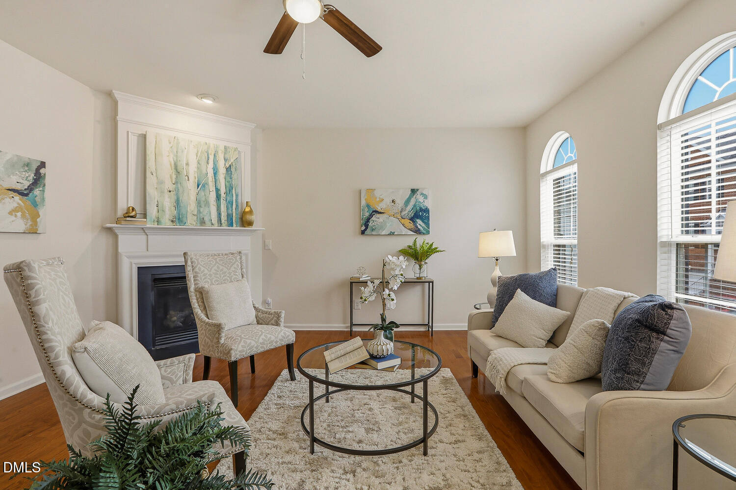 2510 Silverpalm Street Raleigh, NC 27612 - Photo 6 of 65 a living room with furniture and a fireplace