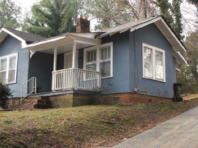 1 Roseway Circle, Unit 53 Rome, GA 30161 - Photo 1 of 1 a front view of a house with a yard
