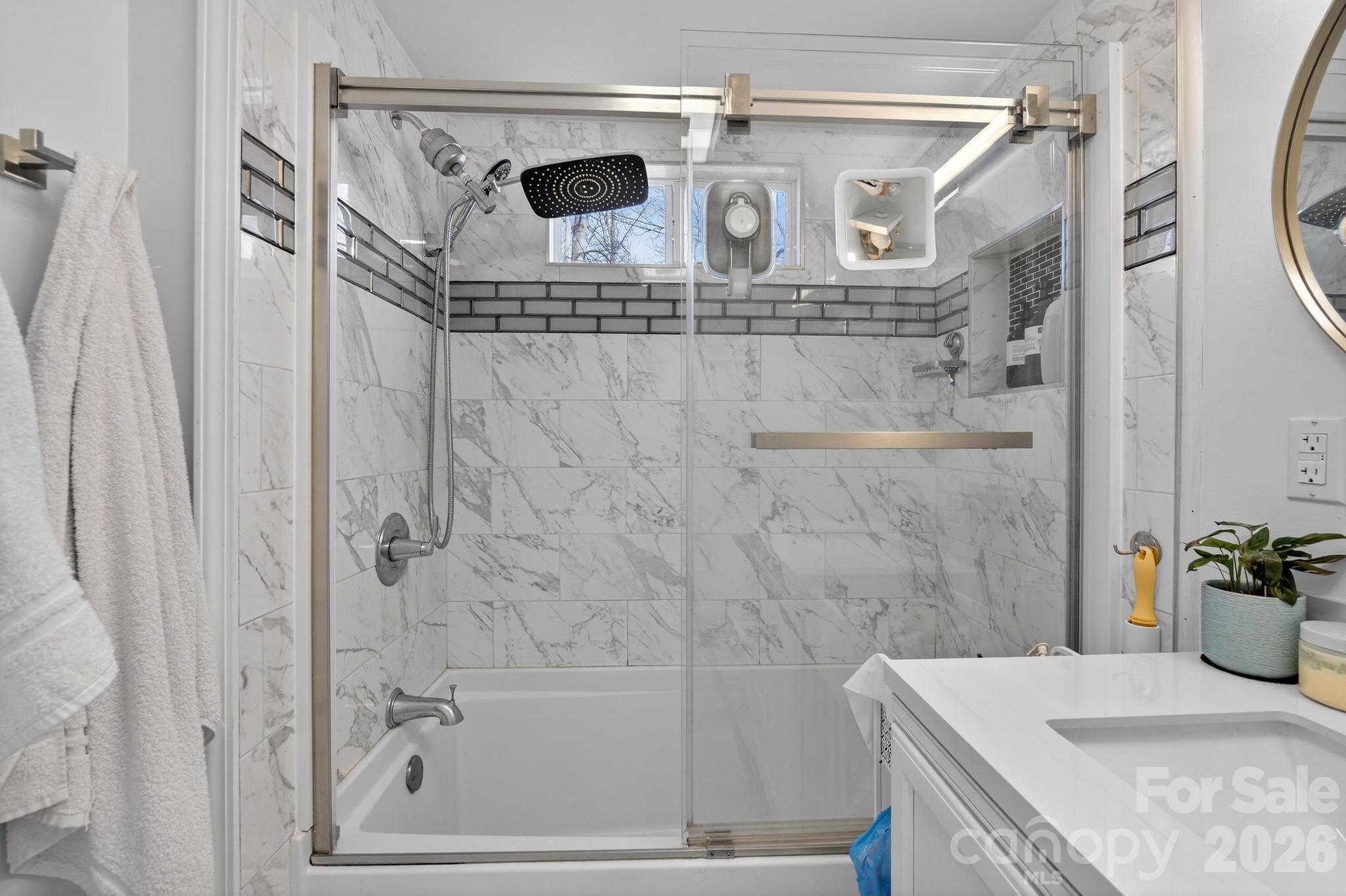105 Countryside Drive Southwest Lenoir, NC 28645 - Photo 17 of 43 a bathroom with a granite countertop shower