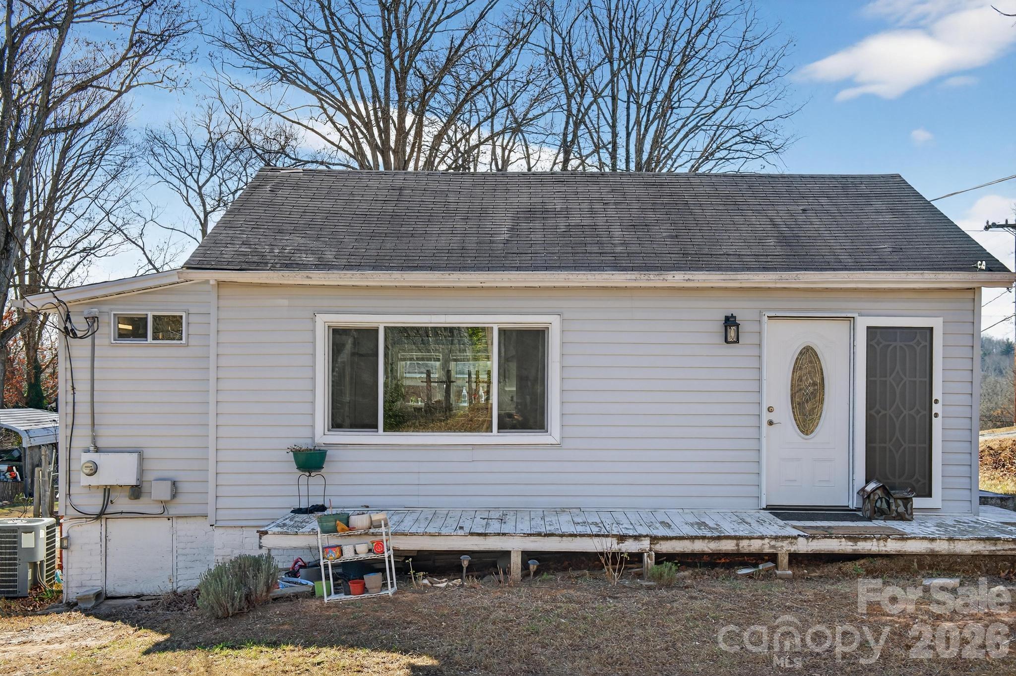 105 Countryside Drive Southwest Lenoir, NC 28645 - Photo 26 of 43 a front view of a house with garage