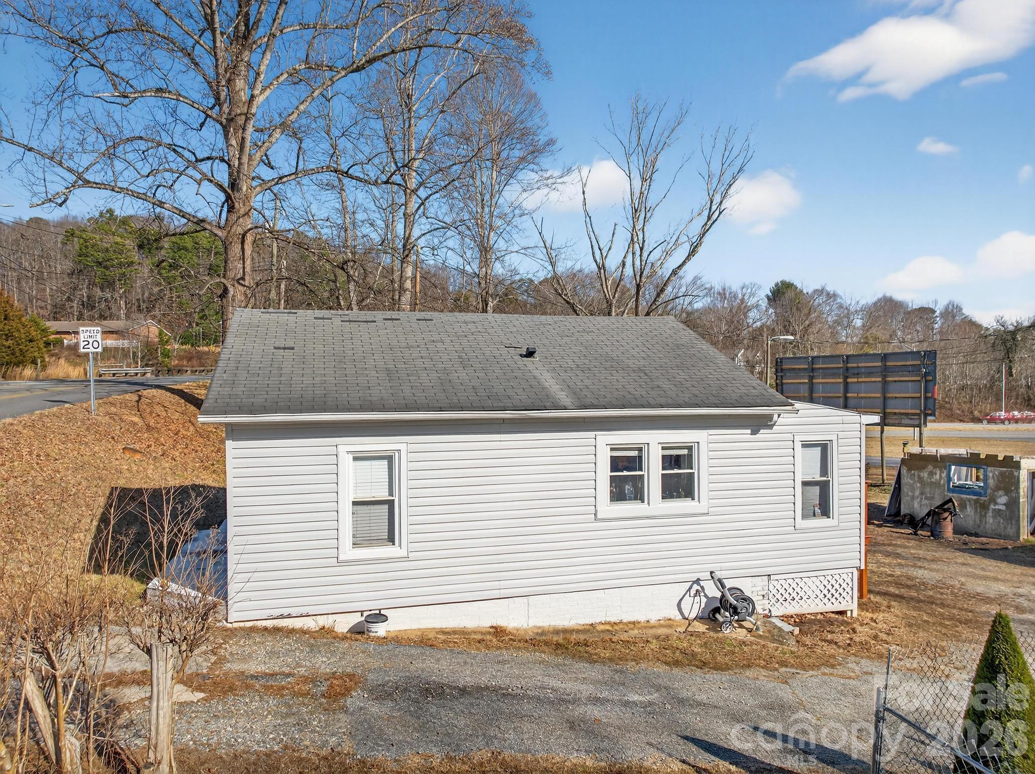 105 Countryside Drive Southwest Lenoir, NC 28645 - Photo 31 of 43 a view of a house with a yard
