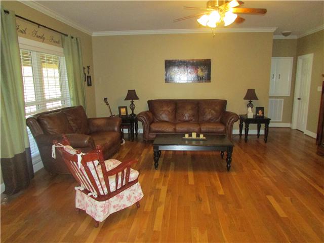 2908 Water Valley Road Santa Fe, TN 38482 - Photo 3 of 20 Warm and Cozy Family Room with Beautiful Hardwood Floors