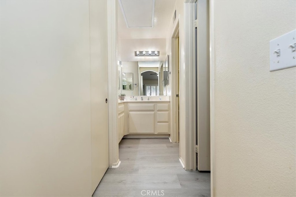 5509 Rodriguez Avenue Banning, CA 92220 - Photo 23 of 36 a bathroom with a sink and a mirror