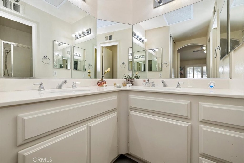 5509 Rodriguez Avenue Banning, CA 92220 - Photo 24 of 36 a bathroom with a sink and a mirror