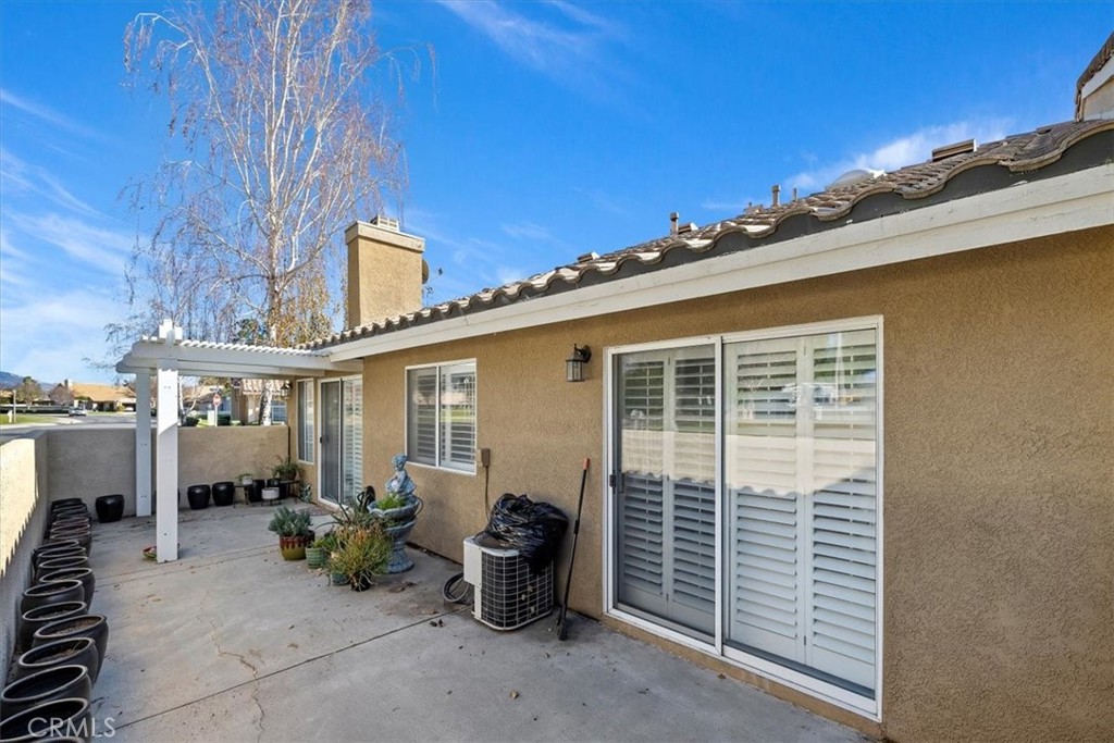 5509 Rodriguez Avenue Banning, CA 92220 - Photo 31 of 36 a view of a patio with couches and potted plants