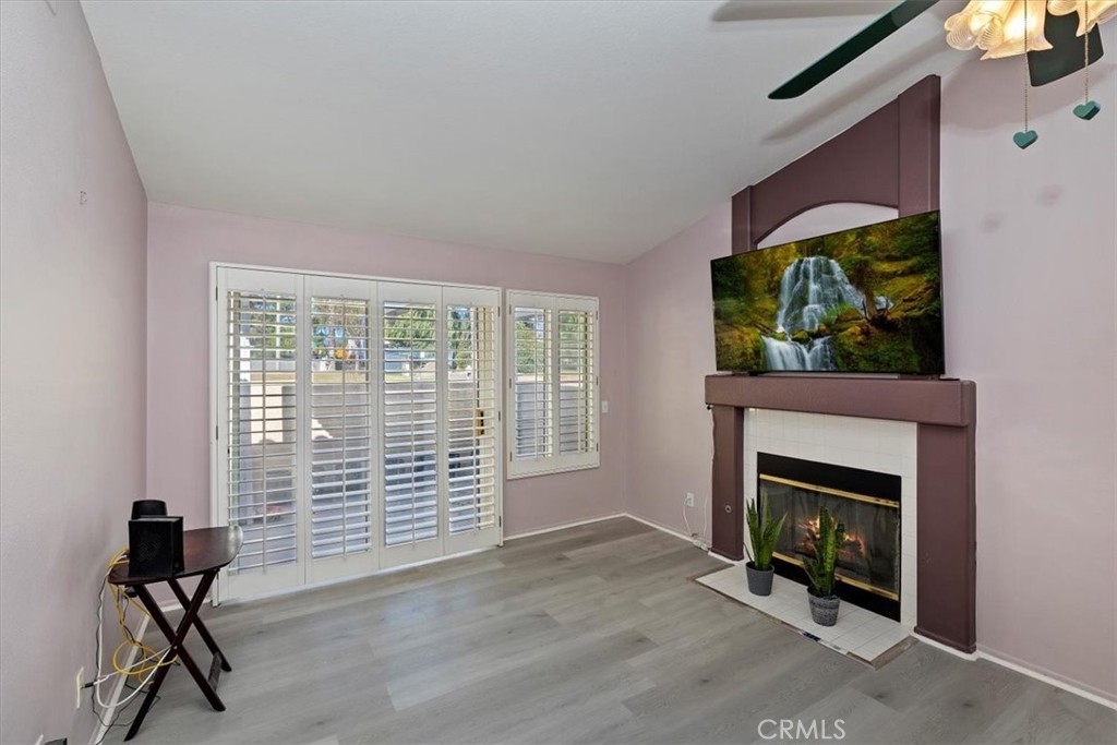 5509 Rodriguez Avenue Banning, CA 92220 - Photo 8 of 36 a view of an empty room with a fireplace and a window