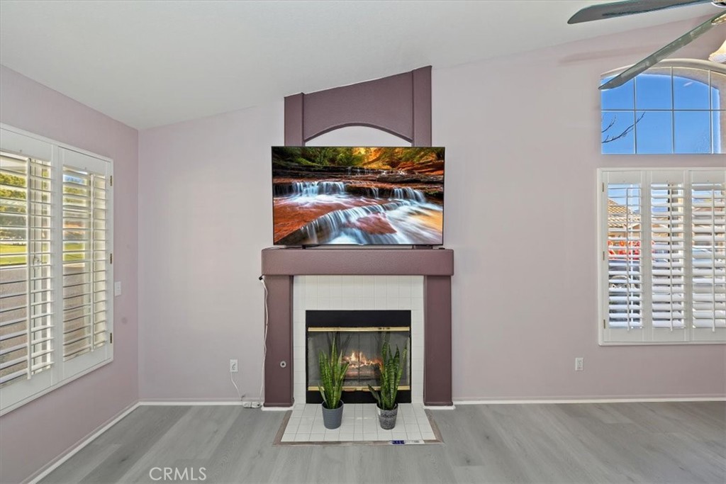 5509 Rodriguez Avenue Banning, CA 92220 - Photo 10 of 36 a view of a livingroom with a fireplace and window