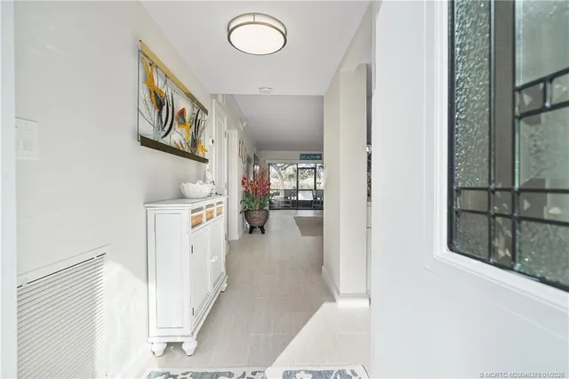 a view of a room that has a bench in it