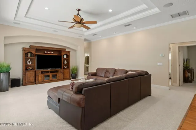 a view of a livingroom with furniture and a fireplace