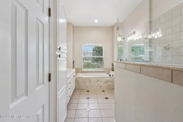 a view of swimming pool with outdoor seating