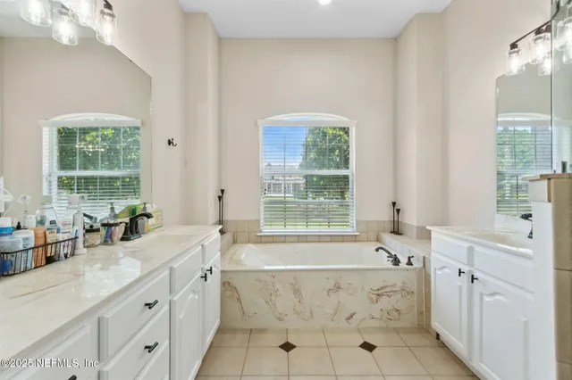 a view of a backyard with sitting area and furniture