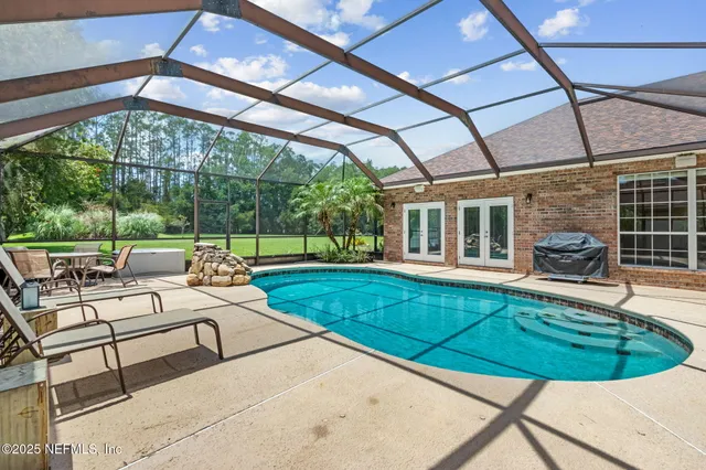 $745,000 | 12610 Angel Lake Drive West, Jacksonville, FL 32218