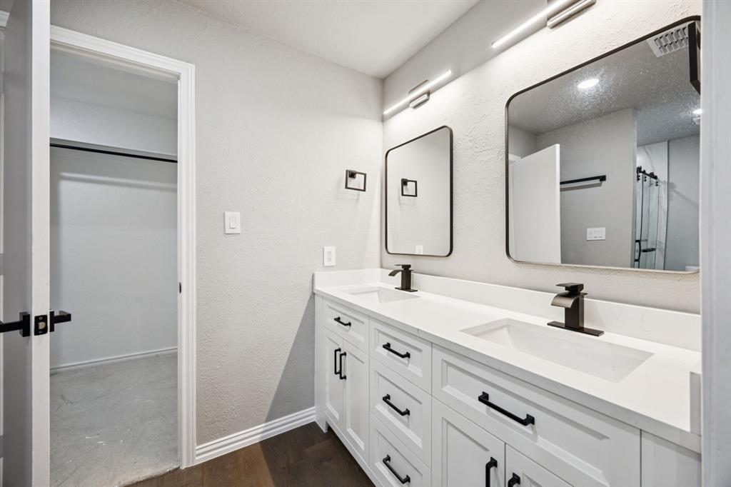 10 Chisholm Trail Lucas, TX 75002 - Photo 32 of 40 a bathroom with a double vanity sink mirror and
