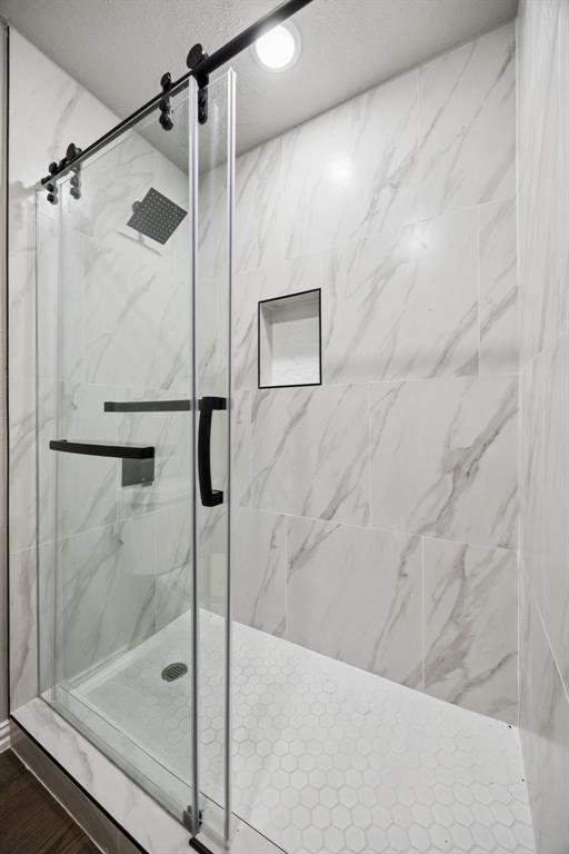 10 Chisholm Trail Lucas, TX 75002 - Photo 33 of 40 a bathroom with a shower