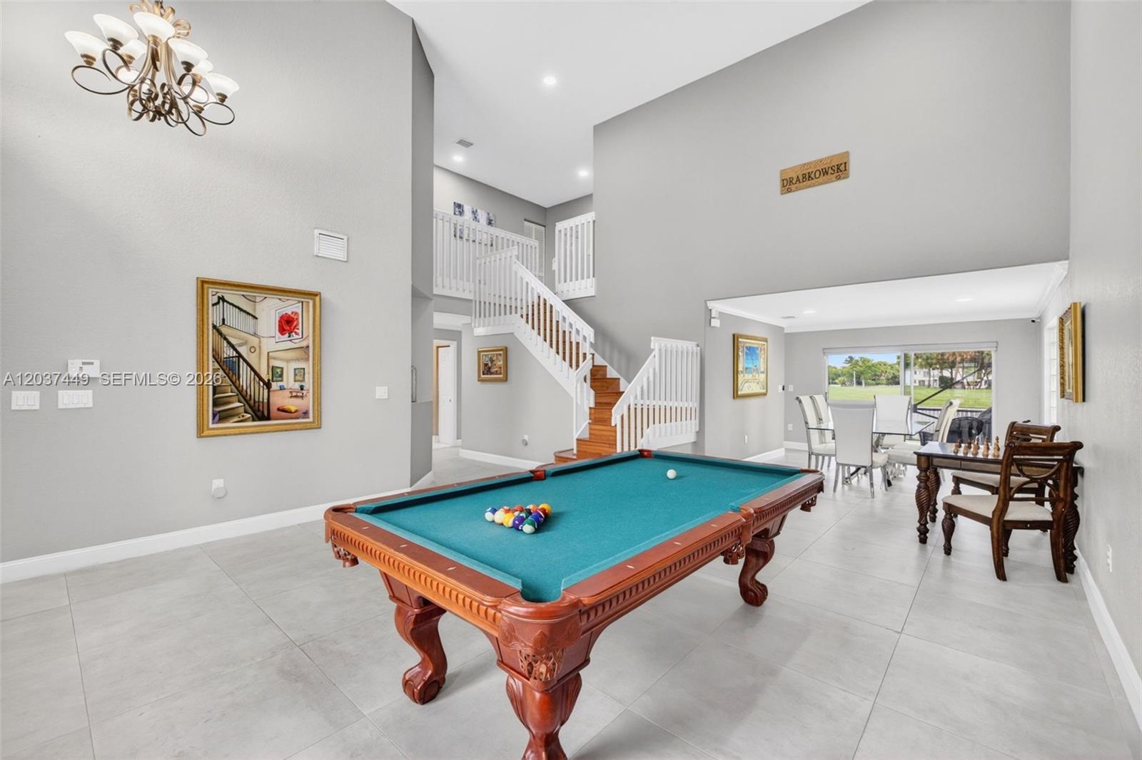 17488 Southwest 28th Court Miramar, FL 33029 - Photo 6 of 50 a room with pool tables and windows