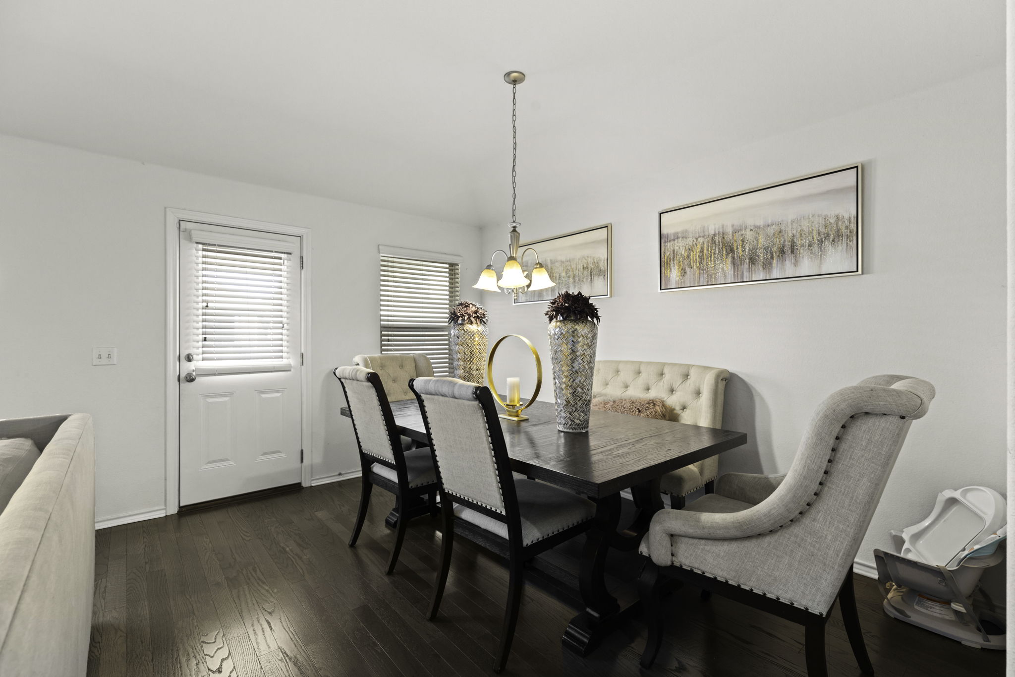 3116 Bragg Place Pflugerville, TX 78660 - Photo 11 of 29 a view of a dining room with furniture window and wooden floor